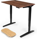 UPLIFTDESK V2 2-Leg Walnut Laminate Wood Standing Desk – Adjustable Height, Advanced 1-Touch Memory Keypad, Under Desk Cable Management, Wire Grommets & Rocker Board (Black C-Frame, 48 x 30 inch)