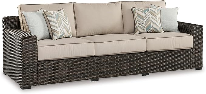 Signature Design by Ashley Coastline Bay Nuvella Weather Resistant Fabric Outdoor Sofa with Cushion and 4 Throw Pillows, Beige & Dark Brown