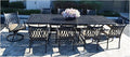 Grand Tuscany Outdoor Cast Aluminum Powder Coated 11-Piece Dining Set with Extendable 48x132 Table (with 2 Rockers and 8 Regular Chairs)