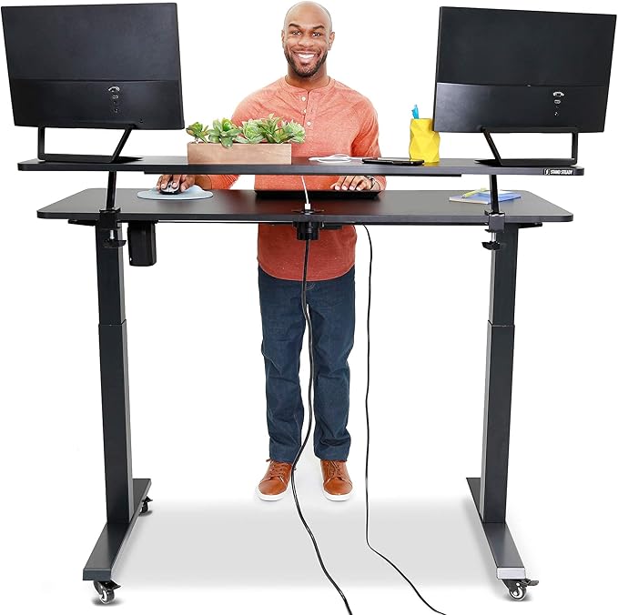 Stand Steady Tranzendesk Power | 55 Inch Electric Standing Desk with Built-In Charging | Height Adjustable Stand Up Desk with Clamp On Shelf | Electronic Desk with 1 AC Outlet & 2 USB Ports (55/Black)