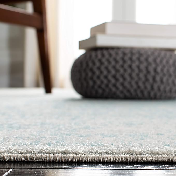 SAFAVIEH Area Rug 9x12 - Evoke Collection - Large - Ivory & Aqua, Distressed Design, Non-Shedding & Easy to Clean, Ideal for Living Room, Bedroom, Dining Space (EVK256J)