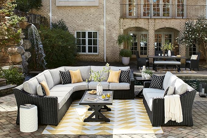 Signature Design by Ashley Beachcroft Casual Nuvella Weather Resistant Fabric Outdoor/Indoor Sofa with Cushion and 2 Toss Pillows, Black & Light Gray