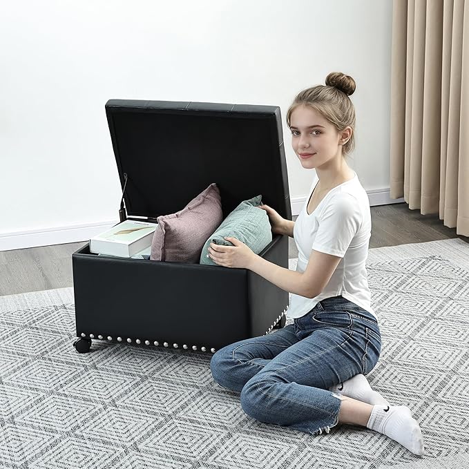 Leather Storage Ottoman Bench with 360° Caster Wheels, 24" Black Rectangle Rolling Ottoman with Storage, Foot Rest Bench Rectangle Ottomans Stool for Living Room Bedroom