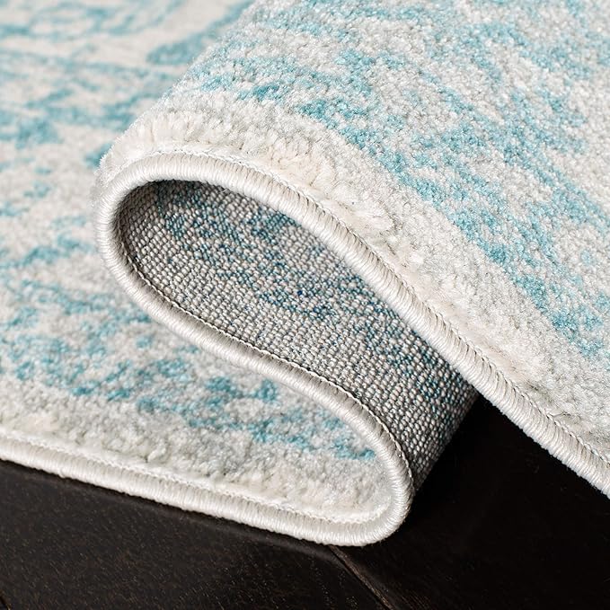 SAFAVIEH Evoke Collection 6'7" x 9' Ivory / Aqua EVK256J Oriental Distressed Non-Shedding Living Room Bedroom Dining Home Office Area Rug